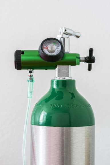 Oxygen tank closeup with a white background.